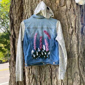 Embroidered Jean jacket with kitty cat hood. Size 10/12 large in girls.